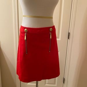 Red game day skirt. Gold details zippers & buttons